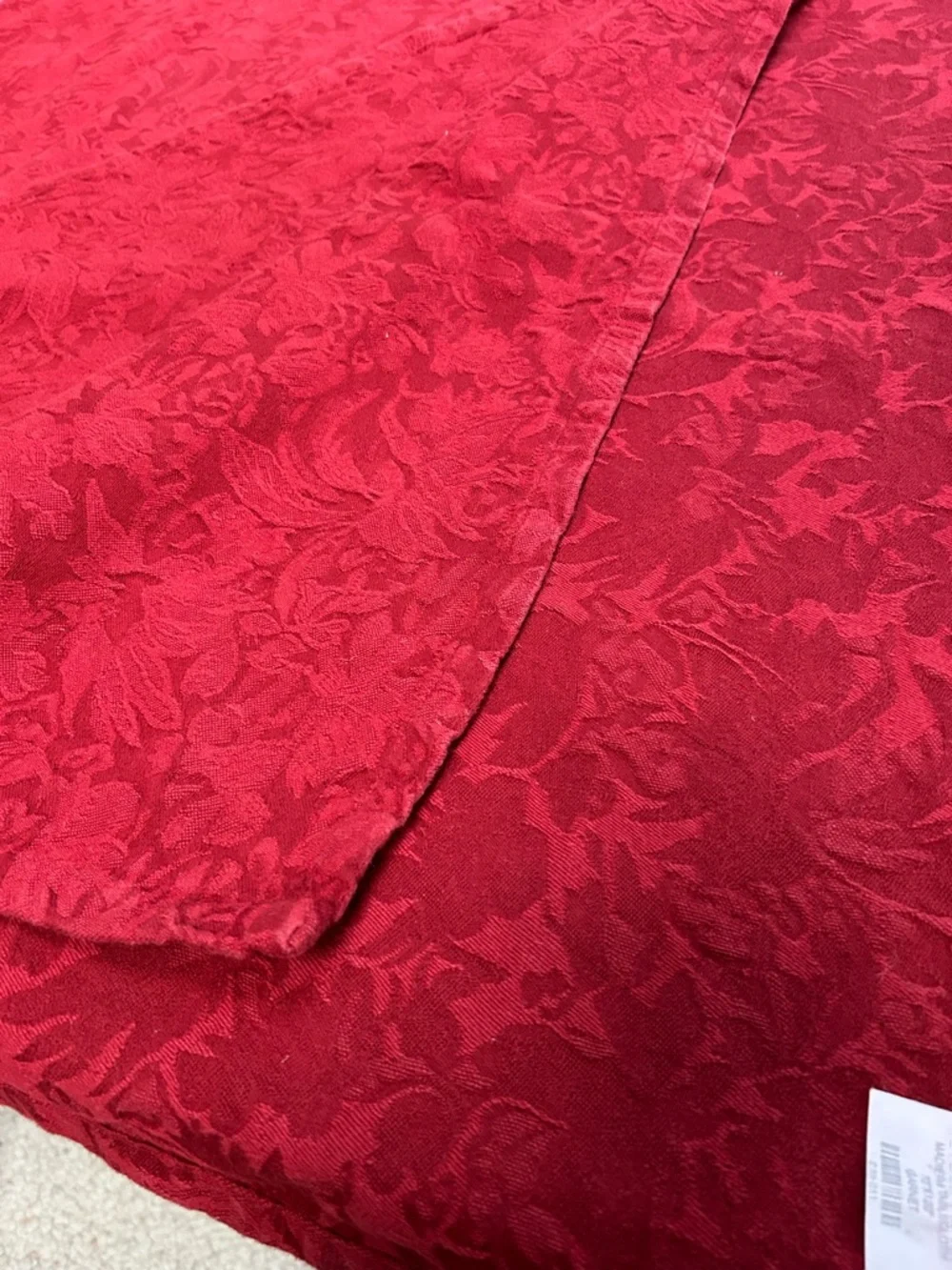 Crate&Barrel Madiera Tablecloth in Garnet Red, 70x120”. Jacquard pattern.